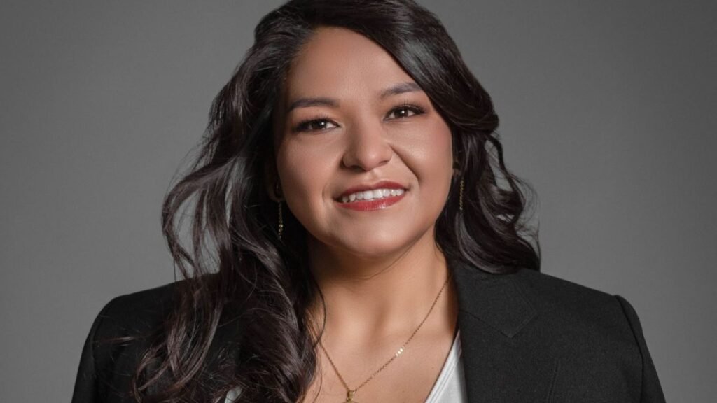Confident businesswoman smiling warmly in a professional portrait