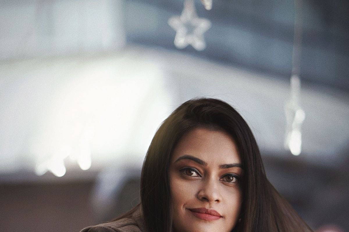 Portrait of a confident smiling woman indoors