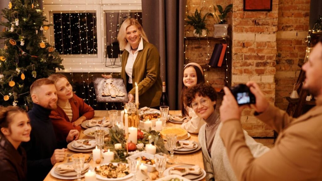 A happy family gathering around a festive Christmas dinner table