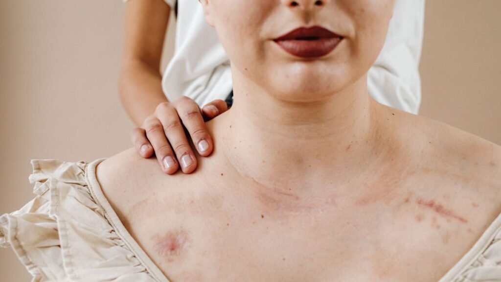A comforting hand gently placed on a woman's shoulder