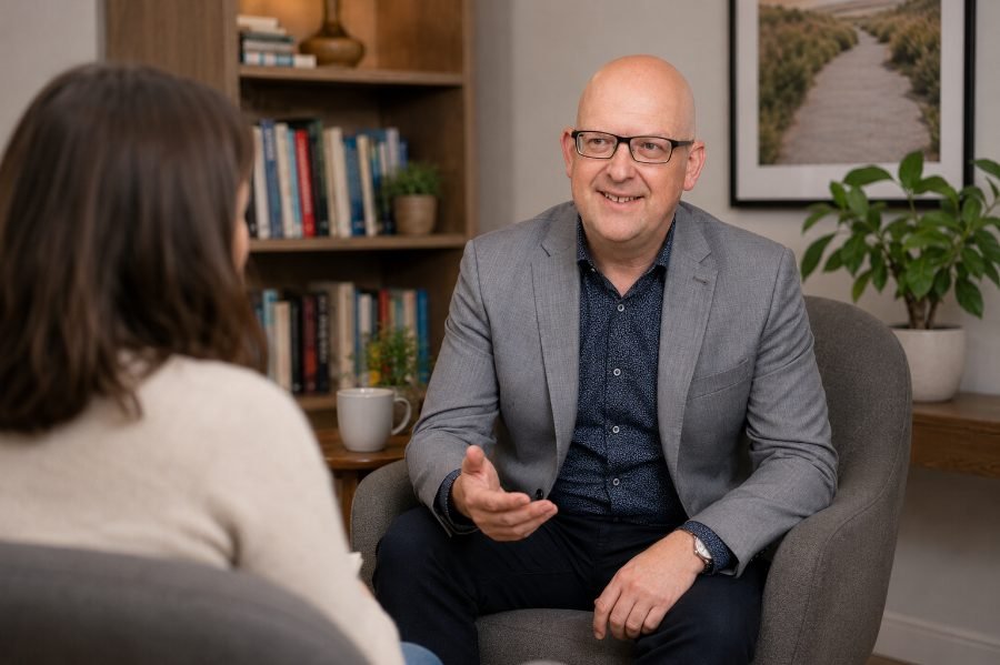 Mark Darlington talking with a client during a coaching session